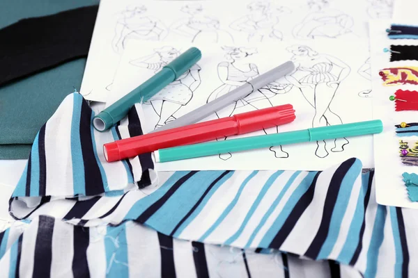 Sketches of clothes and fabric samples — Stock Photo, Image