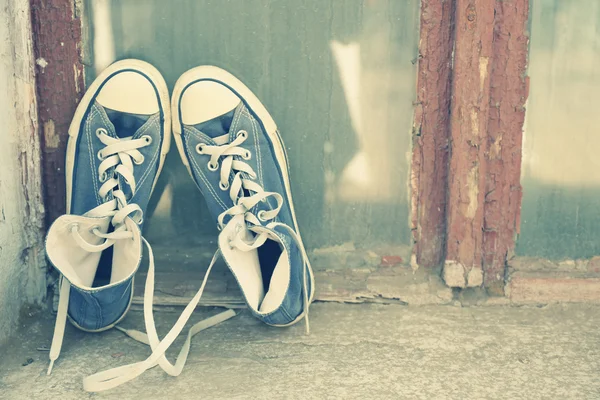 Sneakers on window sill