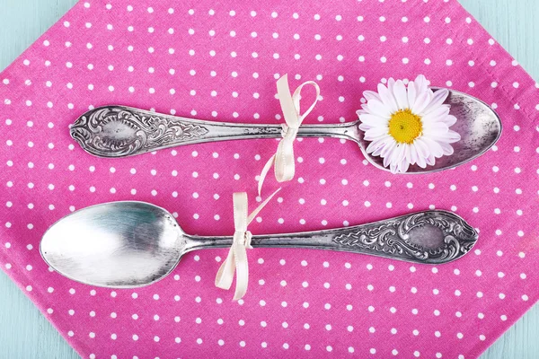 Metal spoons and flowers — Stock Photo, Image