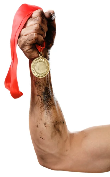 Golden medal in hand — Stock Photo, Image