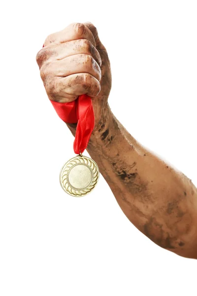 Golden medal in hand — Stock Photo, Image