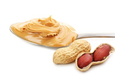 Beyaz izole kaşık krem fıstık yağı