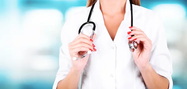 Doctor with stethoscope on hospital — Stock Fotó