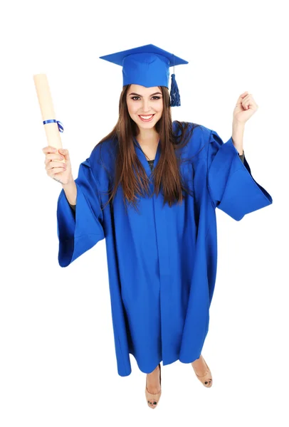 Graduado estudante vestindo chapéu de formatura e vestido — Fotografia de Stock