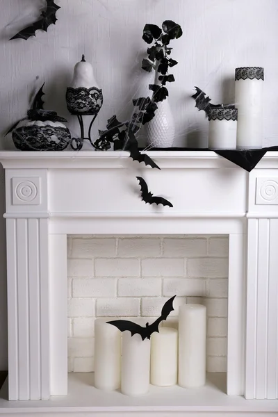 Halloween composition on fireplace — Stock Photo, Image