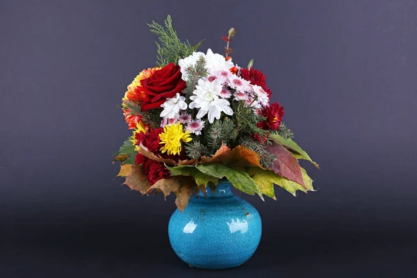 Flower bouquet in blue vase — Stock Photo, Image
