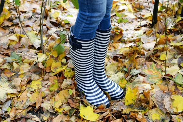 Girl in rubber boots — Stock Photo, Image