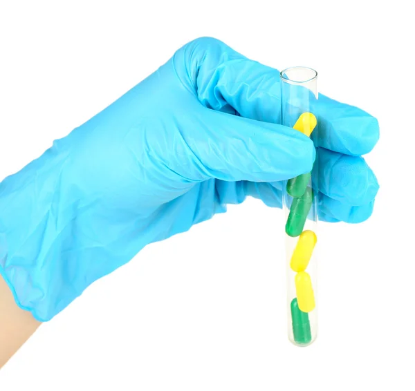 Hand holding test tube with drugs — Stock Photo, Image