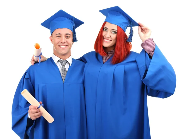 Estudiantes graduados con sombrero y bata de graduación, aislados en blanco —  Fotos de Stock
