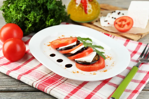 Eggplant salad with tomatoes and feta cheese — Stock Photo, Image