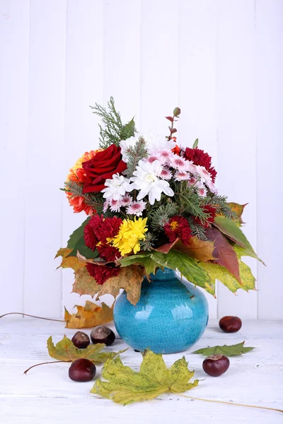 Flower bouquet in blue vase — Stock Photo, Image