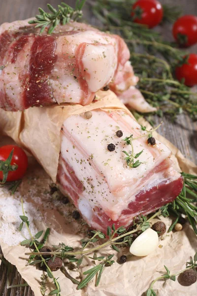 Raw bacon with spices — Stock Photo, Image