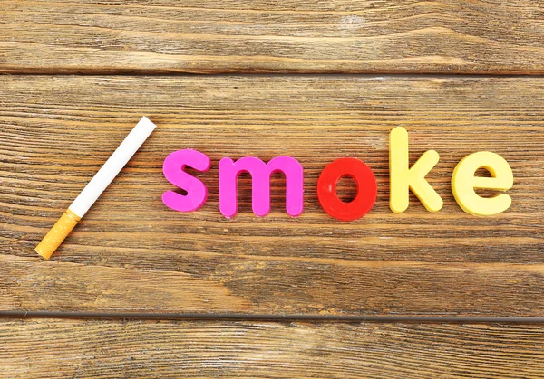 Renkli harfler ile oluşan duman kelime — Stok fotoğraf