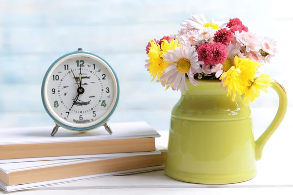 Beautiful flowers in pitcher — Stock Photo, Image