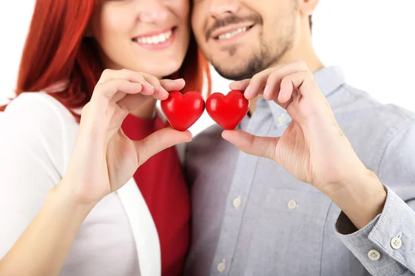 Casal amoroso com corações — Fotografia de Stock