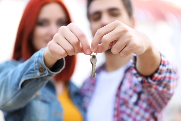 Loving couple with keys