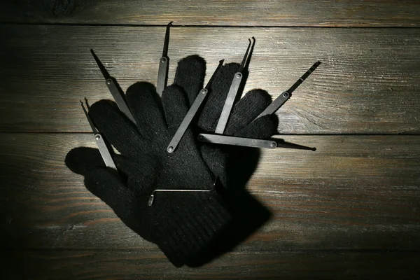 Lock picks with gloves — Stock Photo, Image