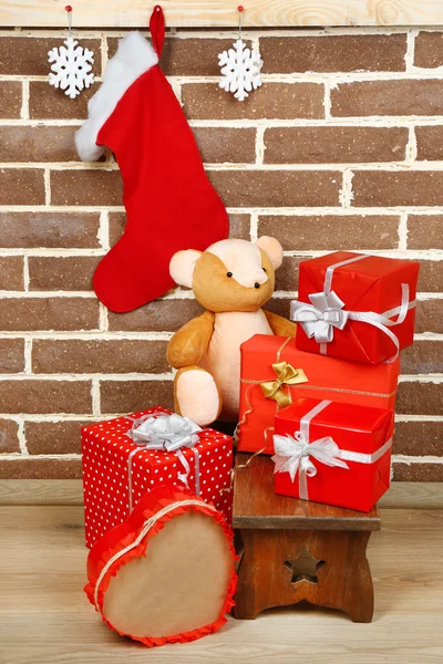 Christmas presents on stool — Stock Photo, Image