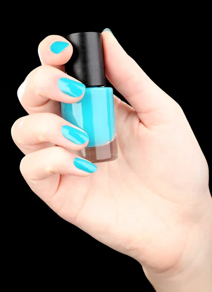 Nail polish in hand — Stock Photo, Image