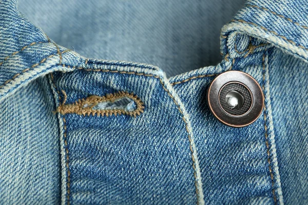 Button on denim clothes — Stock Photo, Image