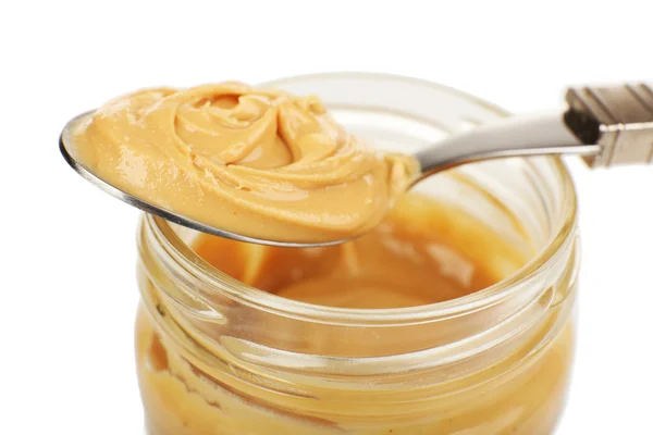 Cremige Erdnussbutter im Glas — Stockfoto