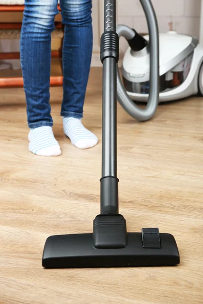 Woman with vacuum cleaner — Stock Photo, Image