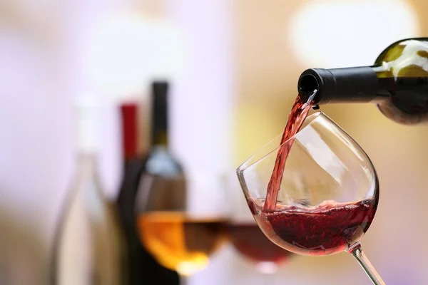 Wine pouring into wine glass — Stock Photo, Image