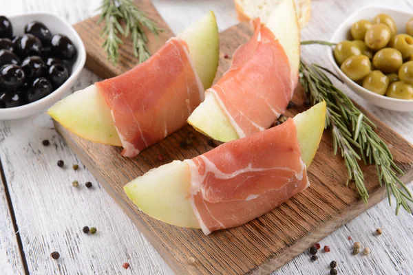 Delicious melon with prosciutto — Stock Photo, Image