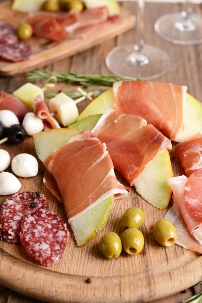 Delicious melon with prosciutto — Stock Photo, Image