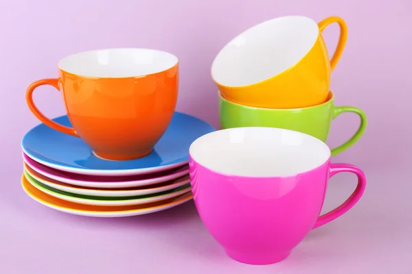 Colorful cups and saucers — Stock Photo, Image