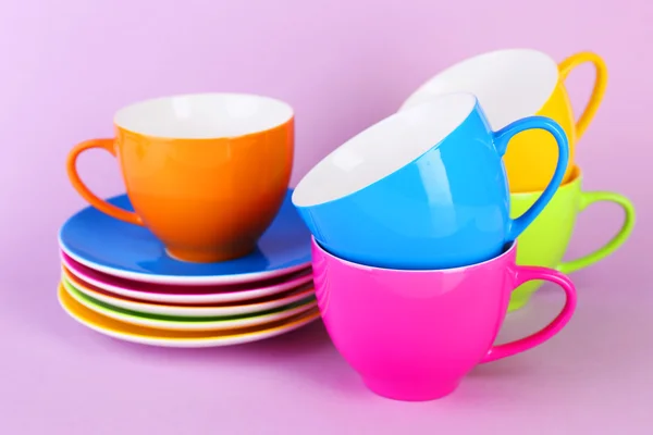 Colorful cups and saucers — Stock Photo, Image