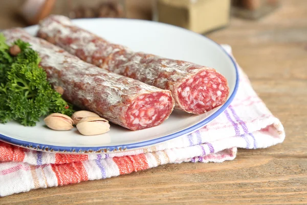 Italian salami on plate — Stock Photo, Image