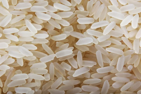 Rice grains background — Stock Photo, Image
