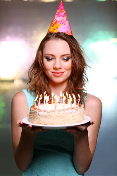 Portrait of beautiful young girl on bright background — Stock Photo, Image