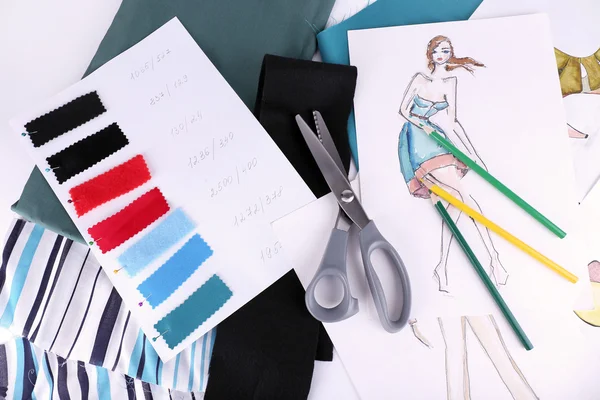 Sketches of clothes and fabric samples — Stock Photo, Image