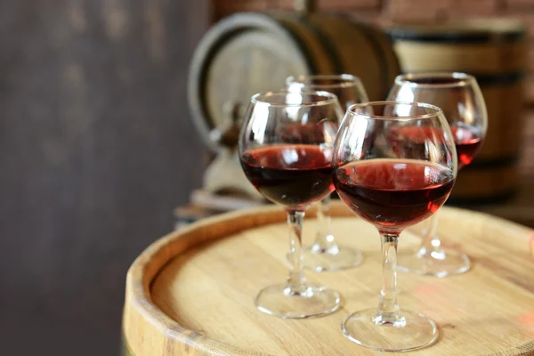 Glasses of wine in cellar — Stock Photo, Image