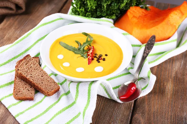 Pumpkin soup in white plate — Stock Photo, Image