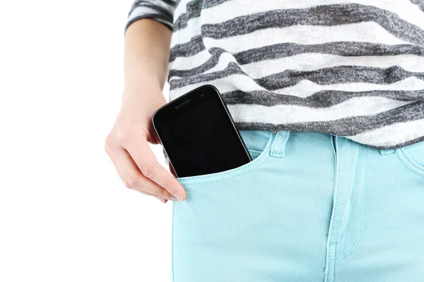 Teléfono inteligente en jeans de bolsillo de cerca — Foto de Stock