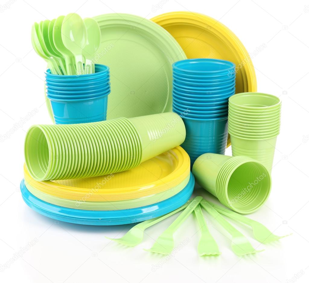 Bright plastic disposable tableware Stock Photo by ©belchonock 59732951