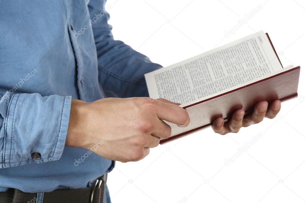 Man holding Bible isolated on white