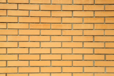 Turuncu tuğla duvar yakın çekim arka plan