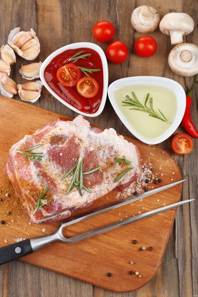 Raw meat on table — Stock Photo, Image