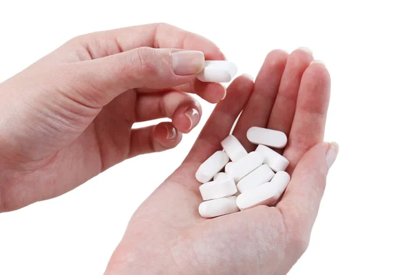 Pills in hands of woman — Stock Photo, Image