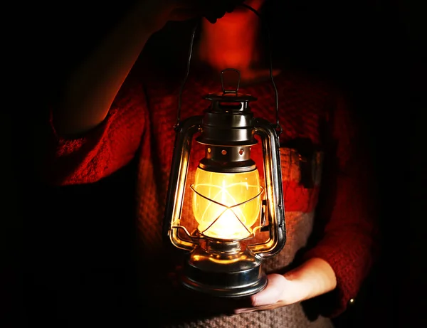 Lantern in hands in darkness — Stock Photo, Image