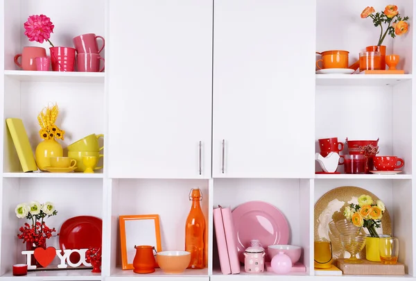 White shelves with colorful things — Stock Photo, Image