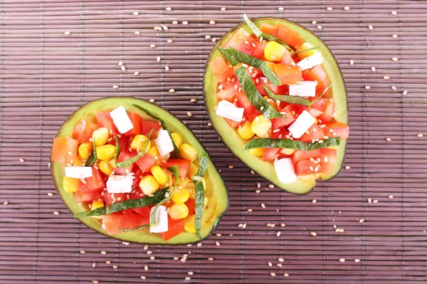 Tasty salad in avocado — Stock Photo, Image