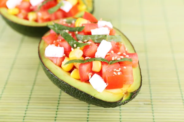 Tasty salad in avocado — Stock Photo, Image