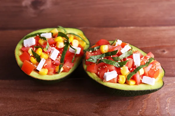 Tasty salad in avocado — Stock Photo, Image