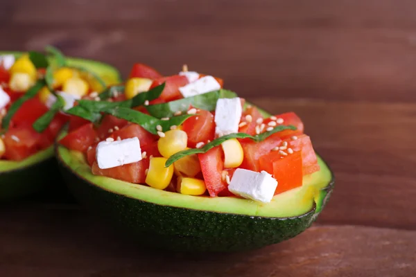 Tasty salad in avocado — Stock Photo, Image