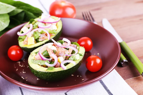 Tasty salad in avocado — Stock Photo, Image